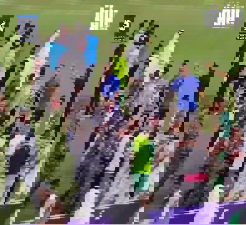 Players using corner flag